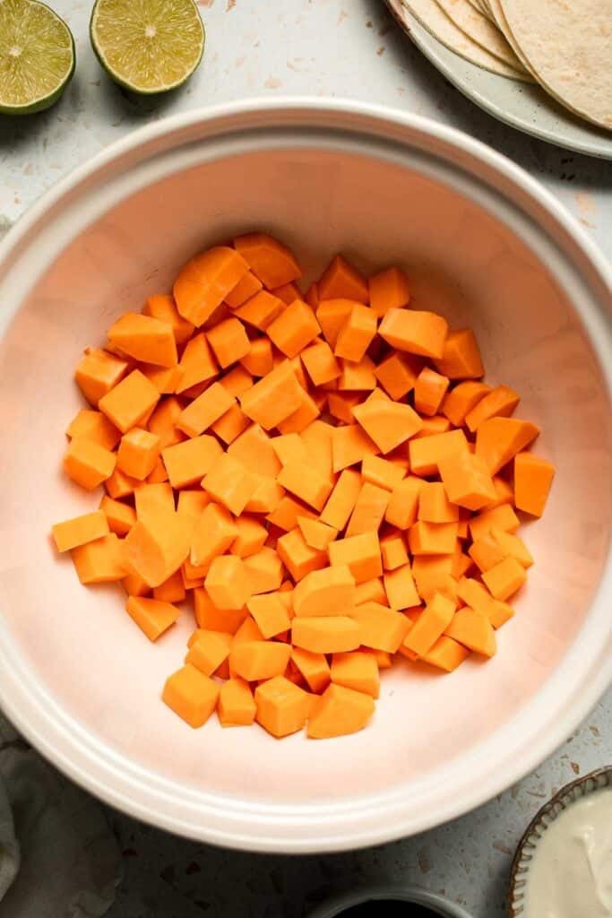 Spice up taco night with these delicious Sweet Potato and Black Bean Tacos. A quick and healthy vegetarian dinner ready in under 30 minutes. | aheadofthyme.com