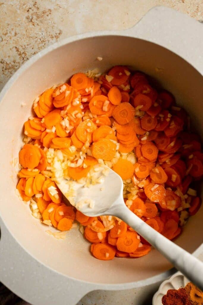 Looking for a hearty and healthy meal? This vegan red lentil soup with carrots is an easy one pot lunch or dinner packed with protein and flavor. | aheadofthyme.com