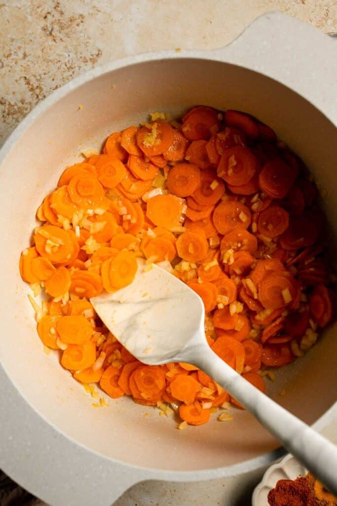 Looking for a hearty and healthy meal? This vegan red lentil soup with carrots is an easy one pot lunch or dinner packed with protein and flavor. | aheadofthyme.com