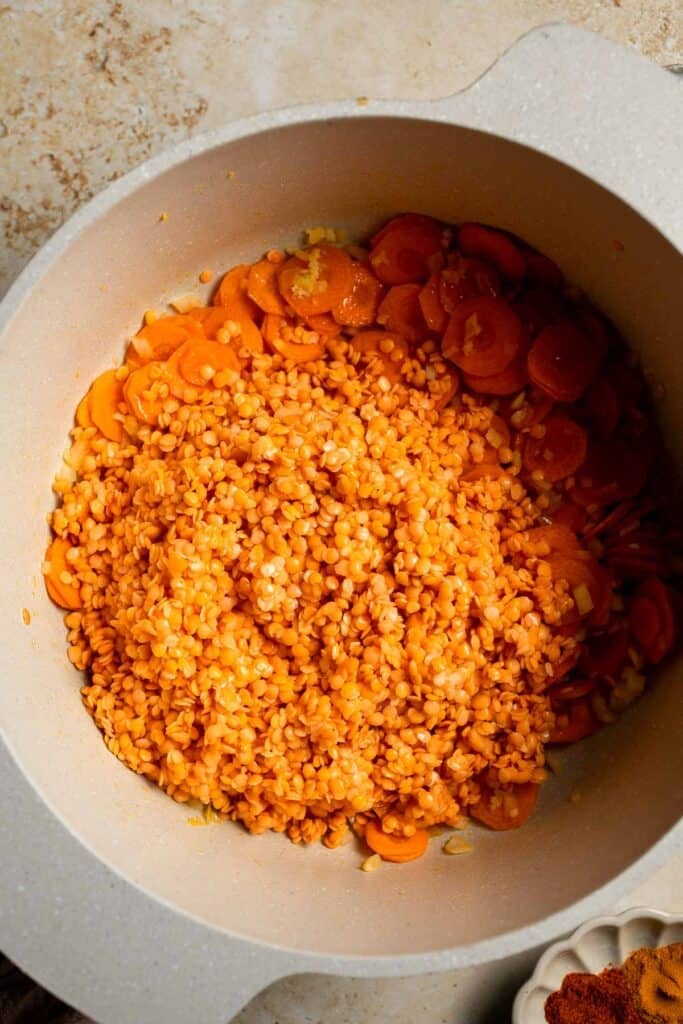 Looking for a hearty and healthy meal? This vegan red lentil soup with carrots is an easy one pot lunch or dinner packed with protein and flavor. | aheadofthyme.com
