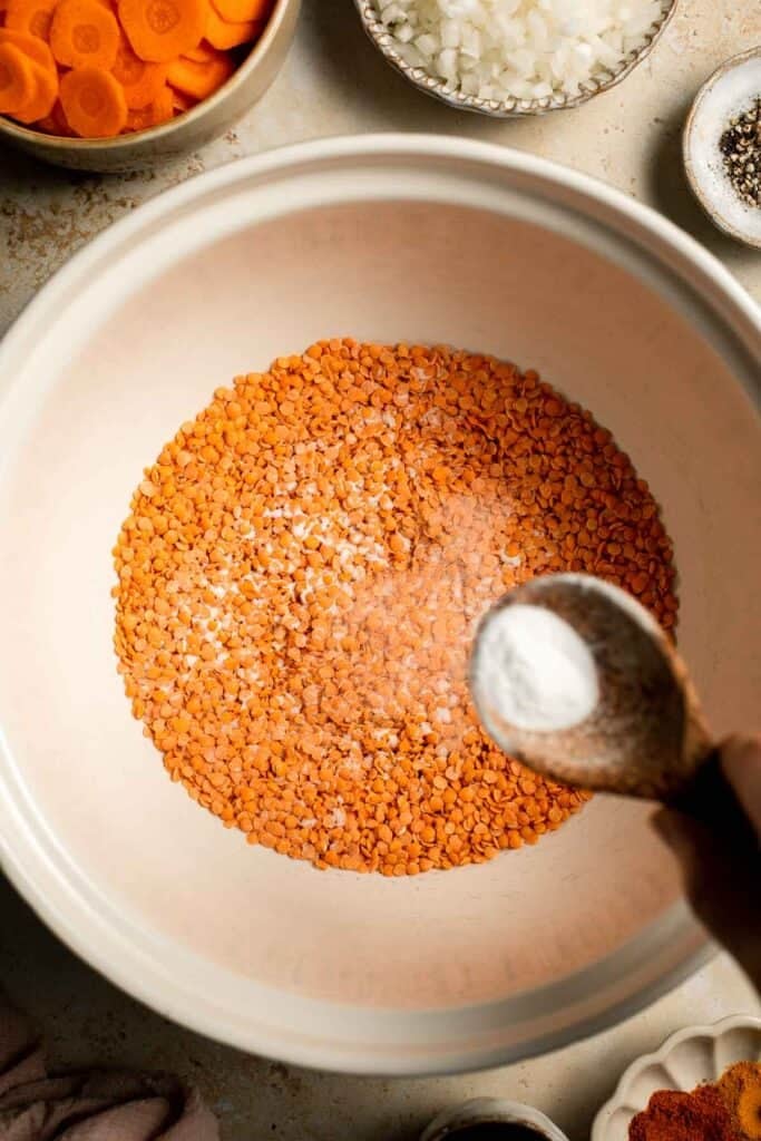 Looking for a hearty and healthy meal? This vegan red lentil soup with carrots is an easy one pot lunch or dinner packed with protein and flavor. | aheadofthyme.com