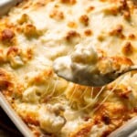 Easy Baked Cauliflower Cheese is the ultimate creamy, cheesy, golden comfort food side dish made with roasted cauliflower and rich homemade cheese sauce. | aheadofthyme.com