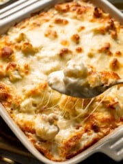 Easy Baked Cauliflower Cheese is the ultimate creamy, cheesy, golden comfort food side dish made with roasted cauliflower and rich homemade cheese sauce. | aheadofthyme.com