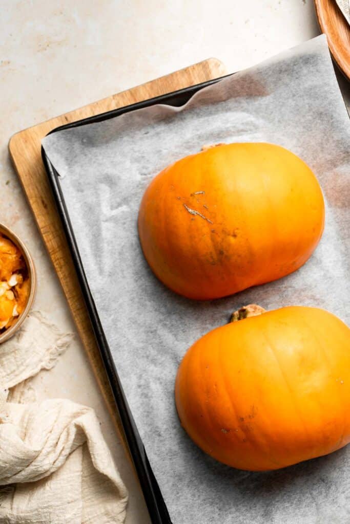 Learn how to make your own homemade pumpkin puree from scratch with this easy recipe. Fresh, creamy, and perfect for all your fall baking needs! | aheadofthyme.com