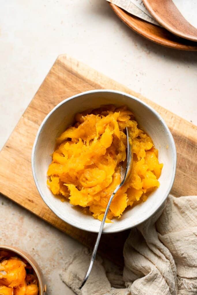 Learn how to make your own homemade pumpkin puree from scratch with this easy recipe. Fresh, creamy, and perfect for all your fall baking needs! | aheadofthyme.com