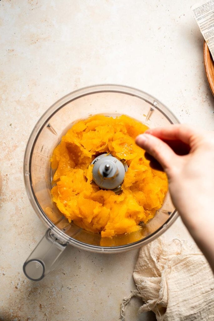 Learn how to make your own homemade pumpkin puree from scratch with this easy recipe. Fresh, creamy, and perfect for all your fall baking needs! | aheadofthyme.com