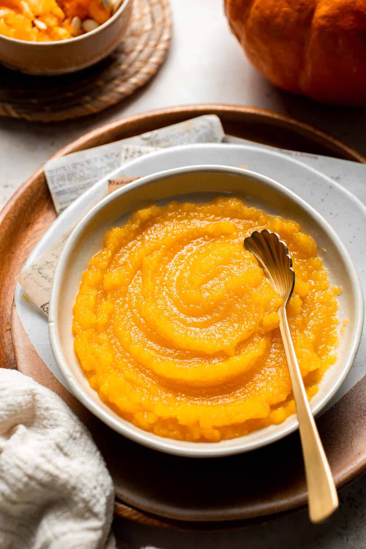 Learn how to make your own homemade pumpkin puree from scratch with this easy recipe. Fresh, creamy, and perfect for all your fall baking needs! | aheadofthyme.com