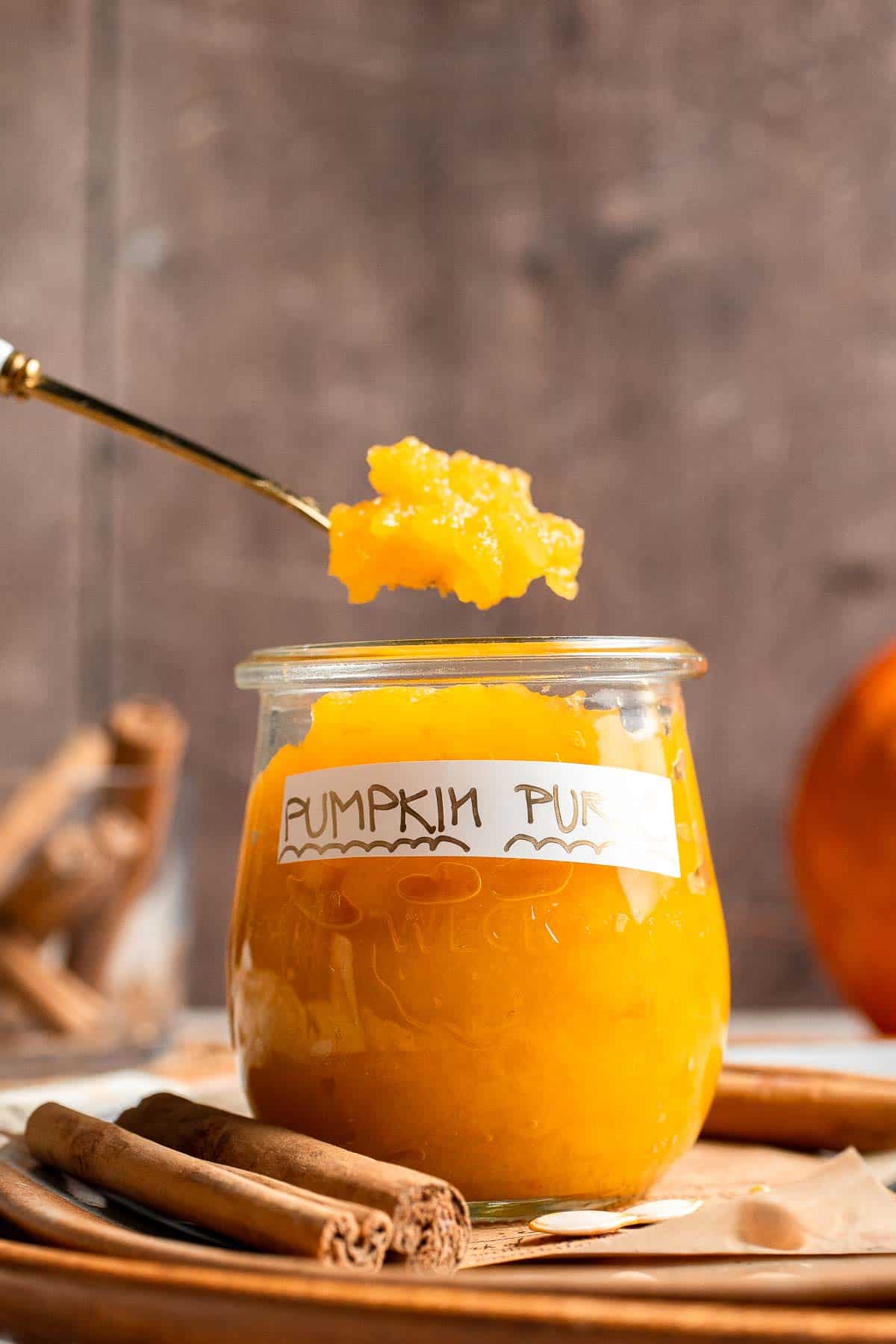 Learn how to make your own homemade pumpkin puree from scratch with this easy recipe. Fresh, creamy, and perfect for all your fall baking needs! | aheadofthyme.com