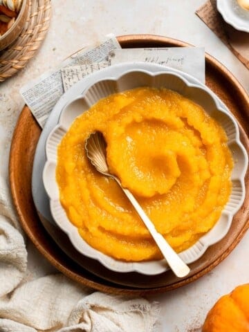 Learn how to make your own homemade pumpkin puree from scratch with this easy recipe. Fresh, creamy, and perfect for all your fall baking needs! | aheadofthyme.com