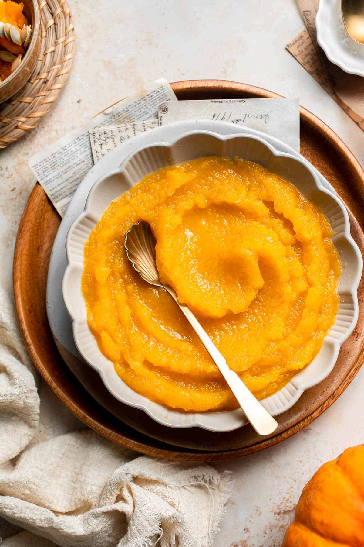 Learn how to make your own homemade pumpkin puree from scratch with this easy recipe. Fresh, creamy, and perfect for all your fall baking needs! | aheadofthyme.com