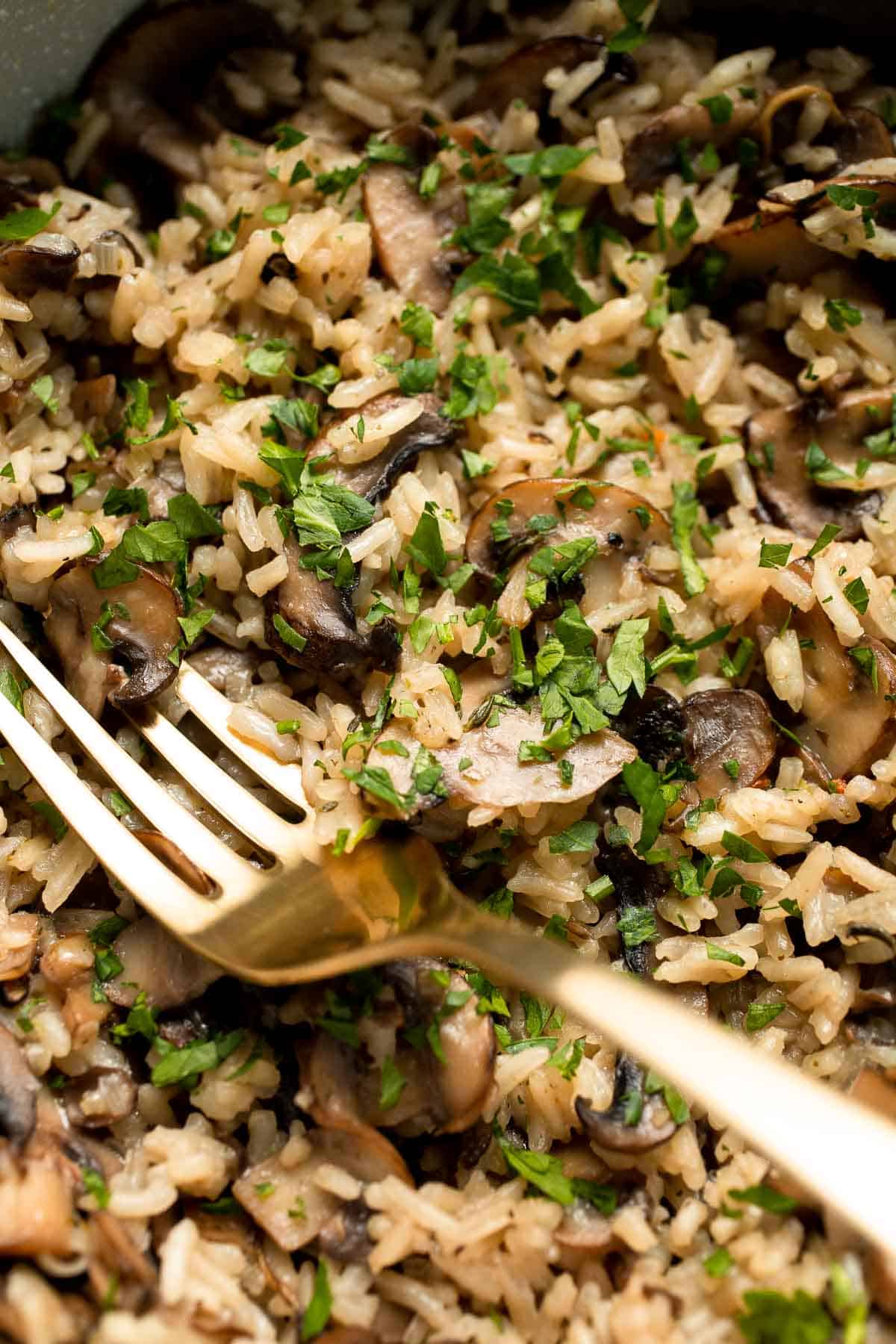 Easy Mushroom Rice is a quick, one-pot side dish packed with buttery rice, golden mushrooms, garlic, and herbs — ready in 30 minutes! | aheadofthyme.com