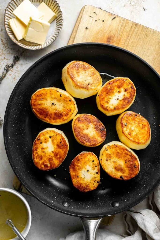 Fondant potatoes, or melting potatoes, are crispy outside and creamy inside. An elegant French side dish that’s perfect for holidays. | aheadofthyme.com