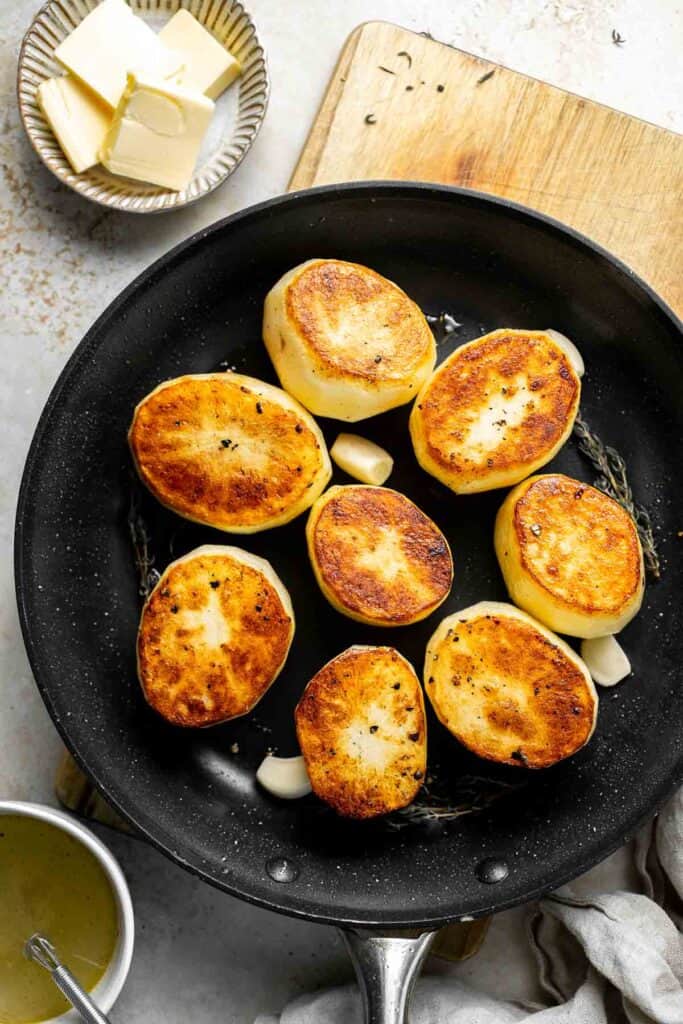 Fondant potatoes, or melting potatoes, are crispy outside and creamy inside. An elegant French side dish that’s perfect for holidays. | aheadofthyme.com