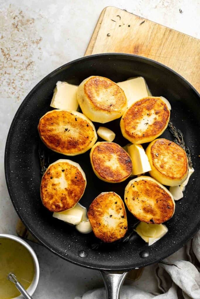 Fondant potatoes, or melting potatoes, are crispy outside and creamy inside. An elegant French side dish that’s perfect for holidays. | aheadofthyme.com