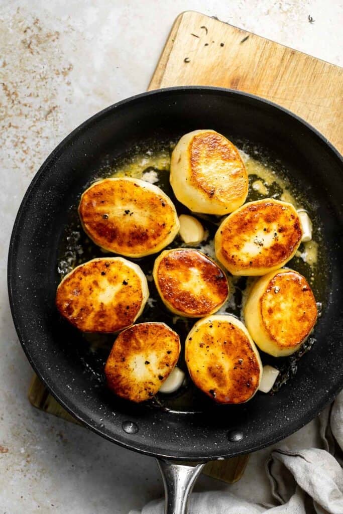 Fondant potatoes, or melting potatoes, are crispy outside and creamy inside. An elegant French side dish that’s perfect for holidays. | aheadofthyme.com