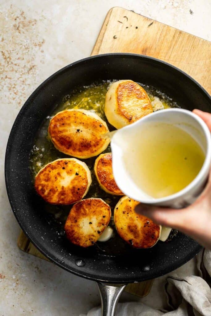 Fondant potatoes, or melting potatoes, are crispy outside and creamy inside. An elegant French side dish that’s perfect for holidays. | aheadofthyme.com
