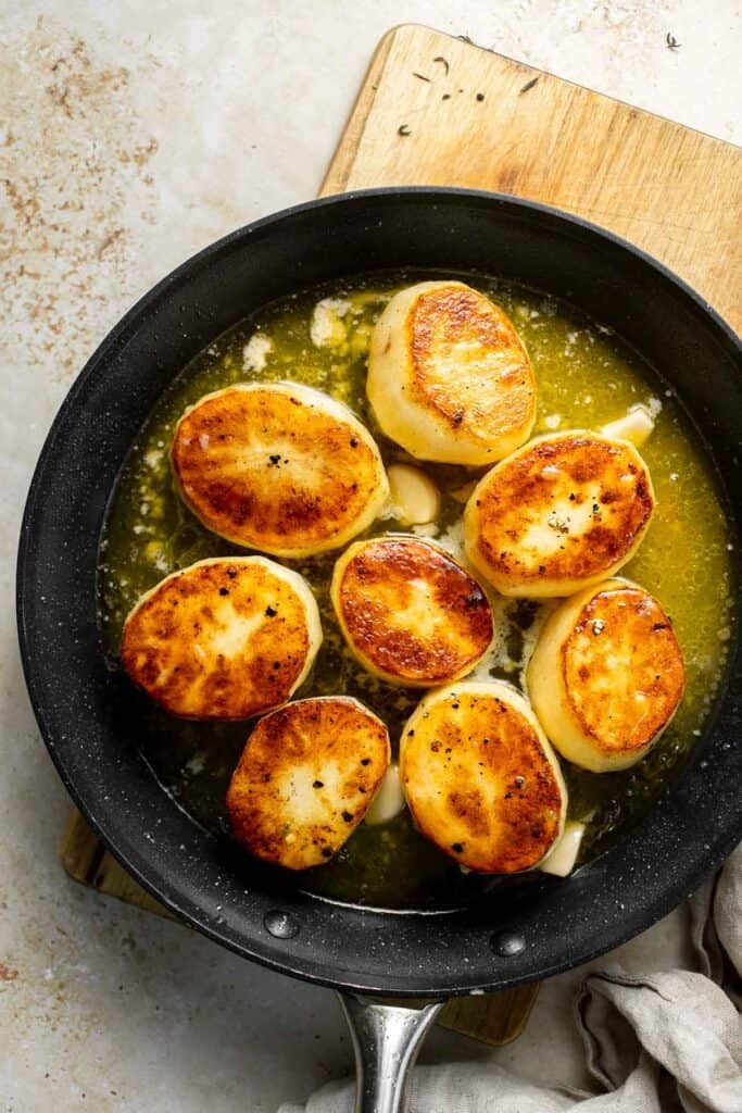 Fondant potatoes, or melting potatoes, are crispy outside and creamy inside. An elegant French side dish that’s perfect for holidays. | aheadofthyme.com
