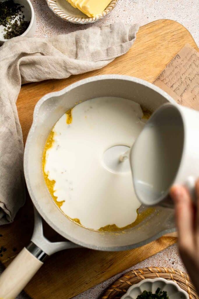 Creamy Garlic Herb Mashed Potatoes are buttery, flavorful, and easy to make. The perfect side dish for holidays or weeknight dinners. | aheadofthyme.com