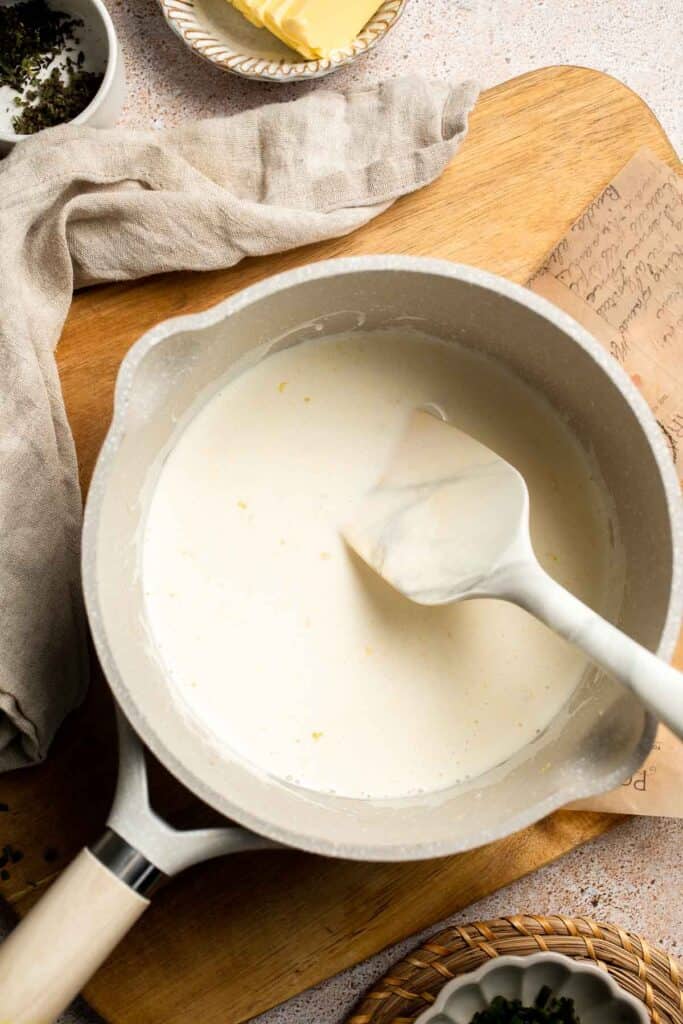 Creamy Garlic Herb Mashed Potatoes are buttery, flavorful, and easy to make. The perfect side dish for holidays or weeknight dinners. | aheadofthyme.com