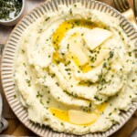 Creamy Garlic Herb Mashed Potatoes are buttery, flavorful, and easy to make. The perfect side dish for holidays or weeknight dinners. | aheadofthyme.com