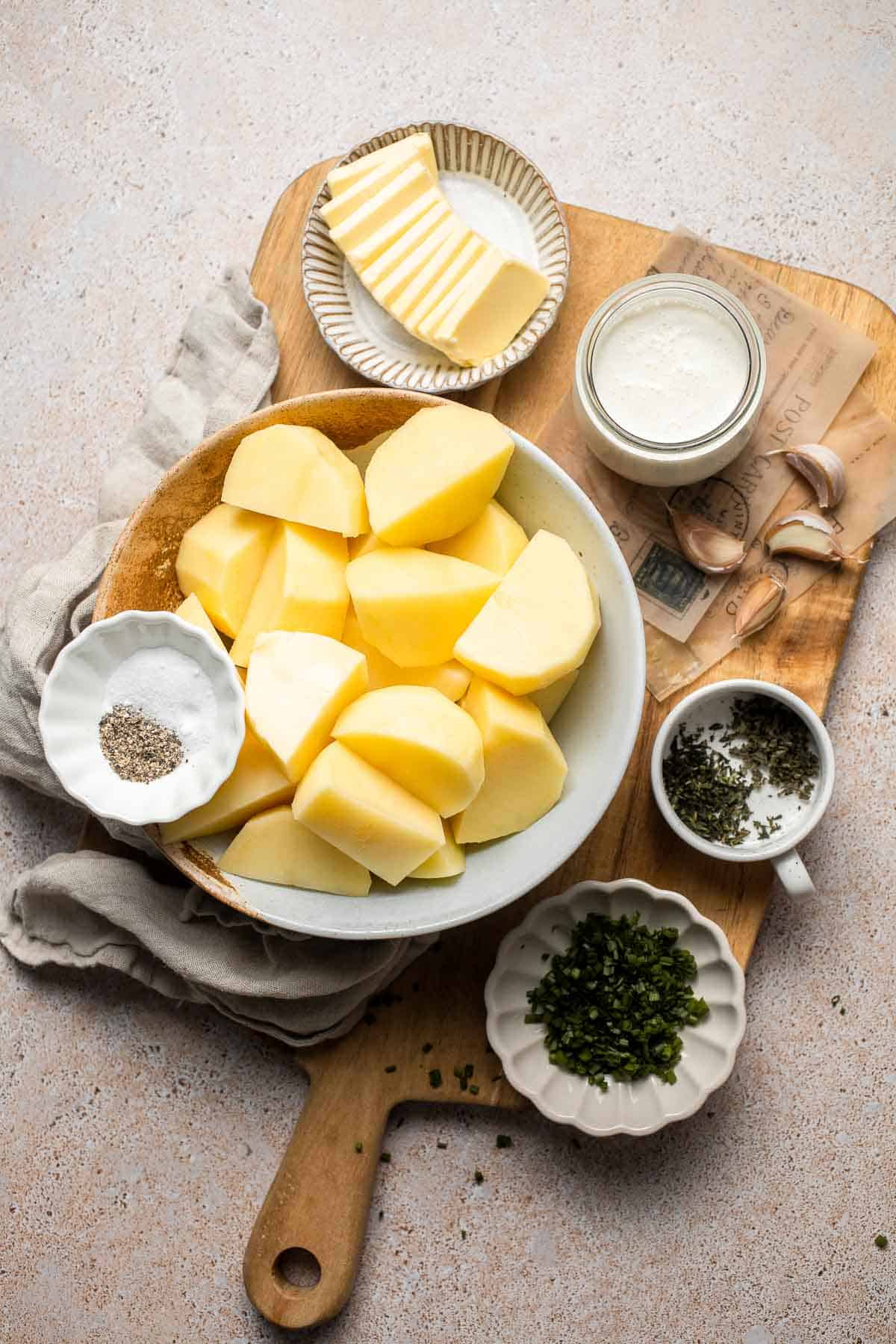 Creamy Garlic Herb Mashed Potatoes are buttery, flavorful, and easy to make. The perfect side dish for holidays or weeknight dinners. | aheadofthyme.com