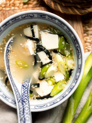 Learn how to make nourishing homemade miso soup with tofu. This traditional Japanese recipe is packed with umami flavor and easy to make in 10 minutes. | aheadofthyme.com