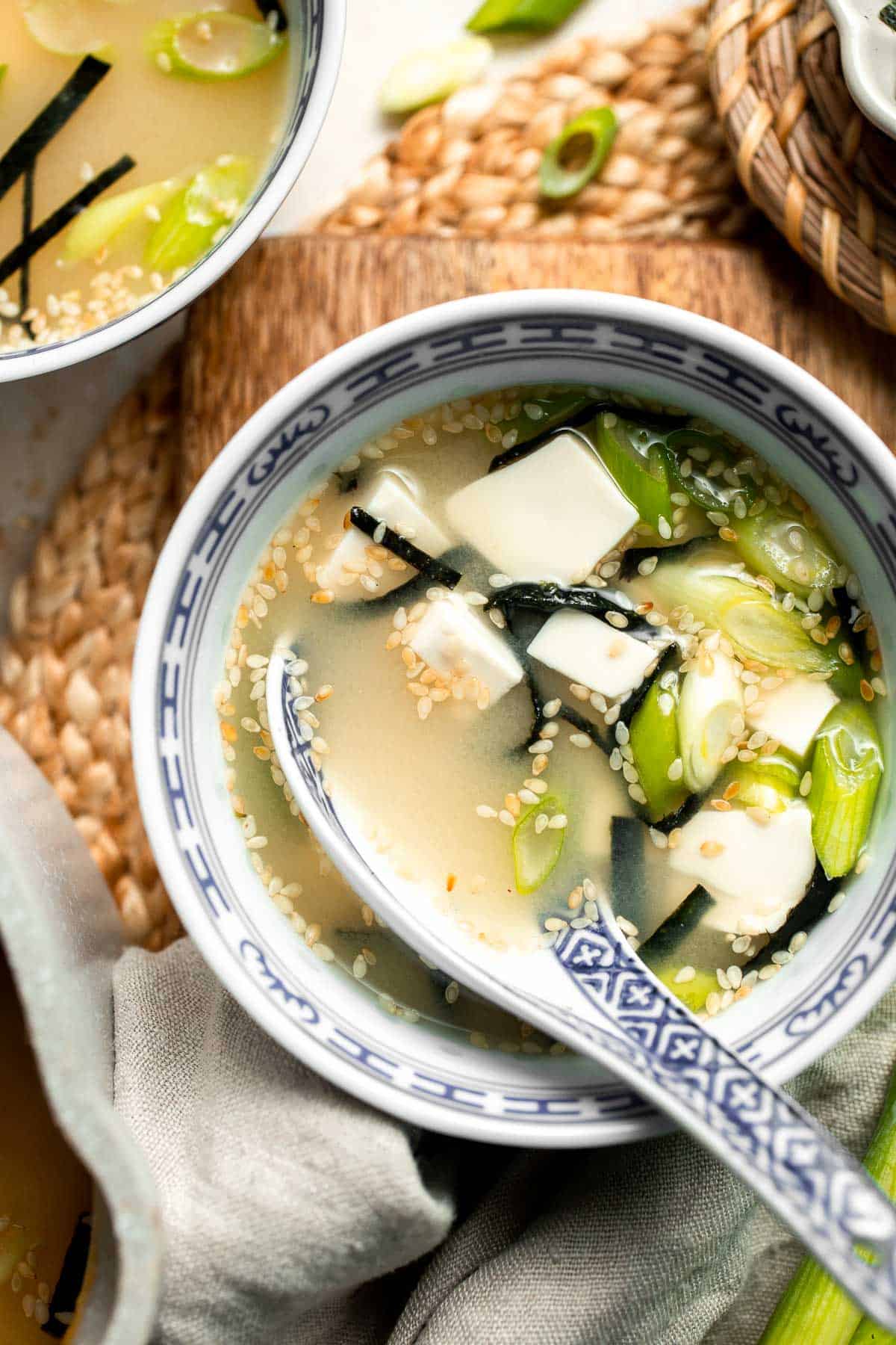 Learn how to make nourishing homemade miso soup with tofu. This traditional Japanese recipe is packed with umami flavor and easy to make in 10 minutes. | aheadofthyme.com