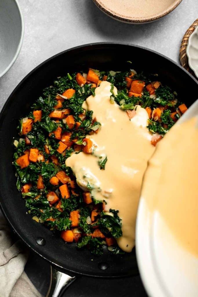 Kale and Sweet Potato Frittata is a protein-packed, one-pan meal with nutrient-dense kale, sweet potatoes, and creamy feta in a fluffy egg base. | aheadofthyme.com