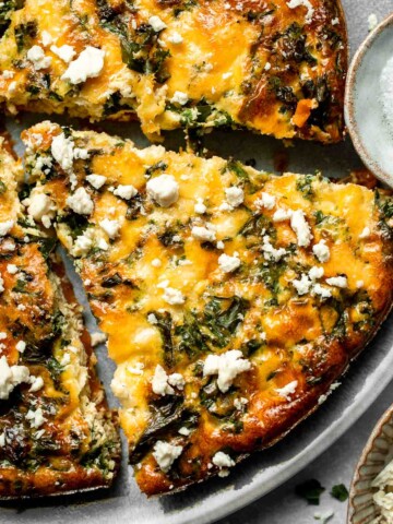 Kale and Sweet Potato Frittata is a protein-packed, one-pan meal with nutrient-dense kale, sweet potatoes, and creamy feta in a fluffy egg base. | aheadofthyme.com