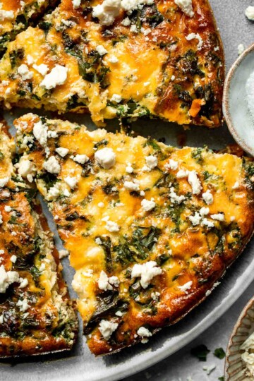 Kale and Sweet Potato Frittata is a protein-packed, one-pan meal with nutrient-dense kale, sweet potatoes, and creamy feta in a fluffy egg base. | aheadofthyme.com