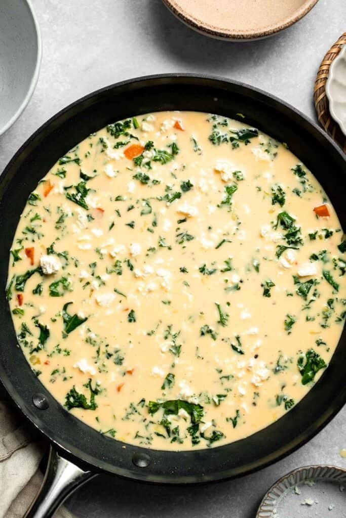 Kale and Sweet Potato Frittata is a protein-packed, one-pan meal with nutrient-dense kale, sweet potatoes, and creamy feta in a fluffy egg base. | aheadofthyme.com