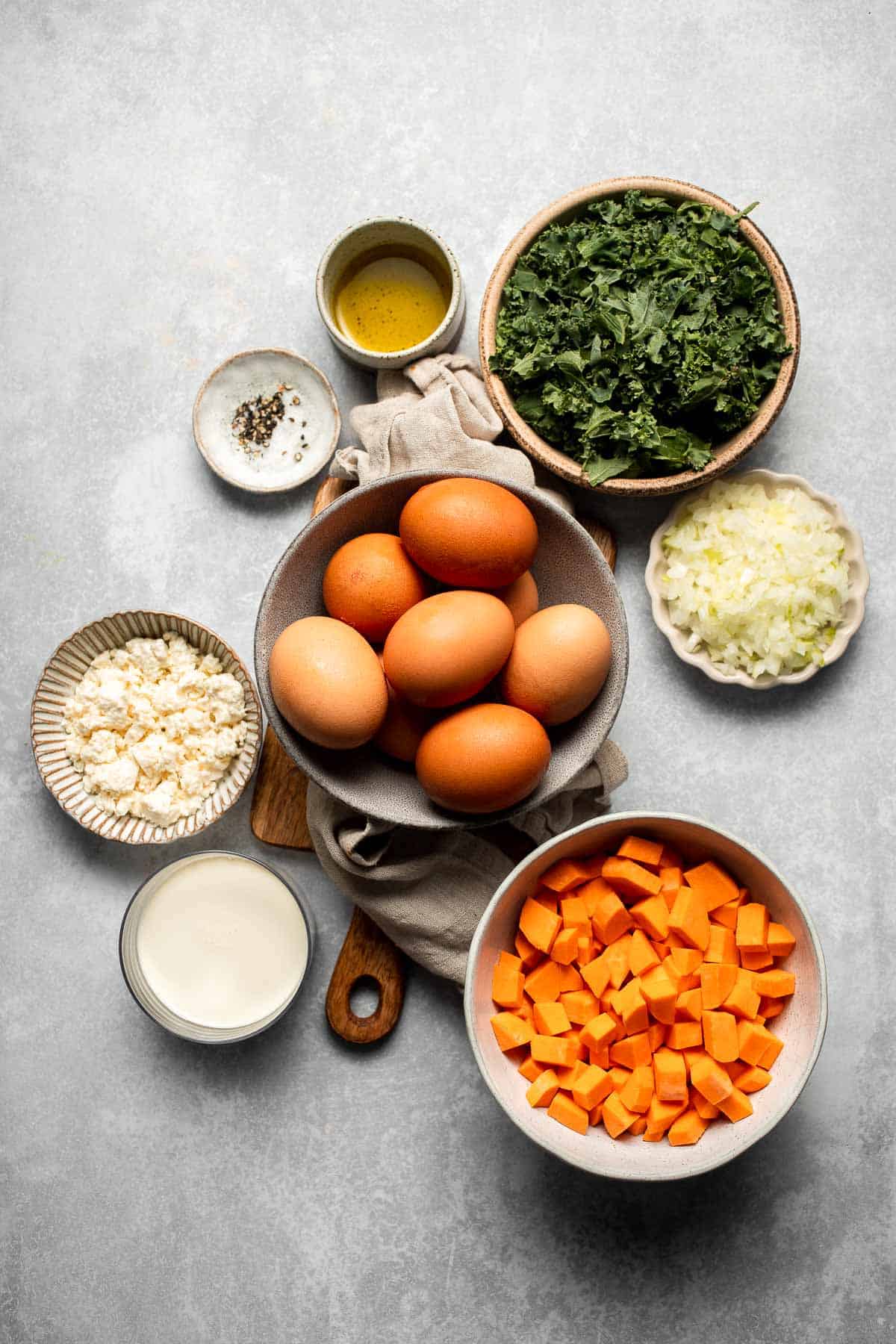 Kale and Sweet Potato Frittata is a protein-packed, one-pan meal with nutrient-dense kale, sweet potatoes, and creamy feta in a fluffy egg base. | aheadofthyme.com