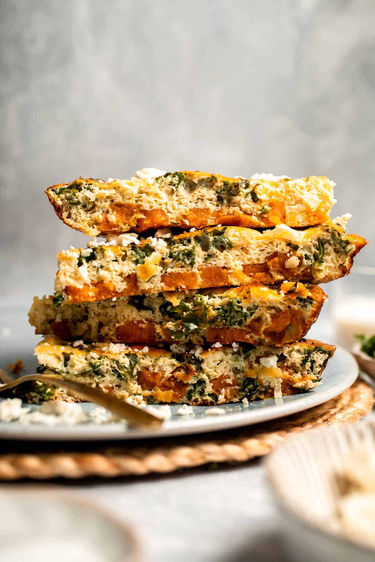 Kale and Sweet Potato Frittata is a protein-packed, one-pan meal with nutrient-dense kale, sweet potatoes, and creamy feta in a fluffy egg base. | aheadofthyme.com