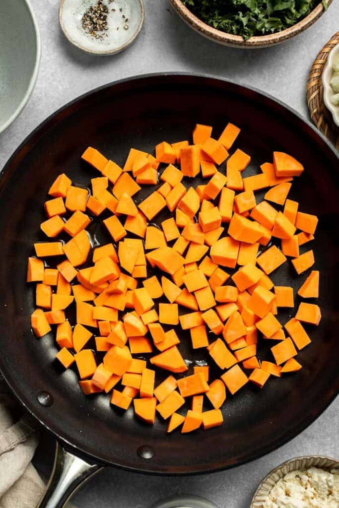 Kale and Sweet Potato Frittata is a protein-packed, one-pan meal with nutrient-dense kale, sweet potatoes, and creamy feta in a fluffy egg base. | aheadofthyme.com