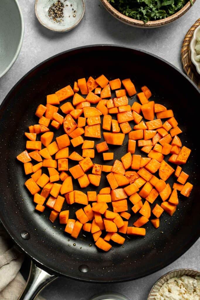 Kale and Sweet Potato Frittata is a protein-packed, one-pan meal with nutrient-dense kale, sweet potatoes, and creamy feta in a fluffy egg base. | aheadofthyme.com