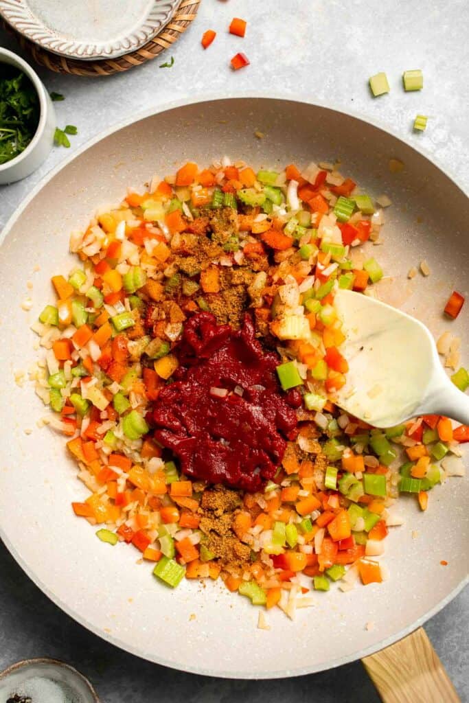 One Pot Vegetarian Jambalaya is a bold, flavorful Cajun rice dish with beans and veggies that's hearty, healthy, and easy to make. | aheadofthyme.com