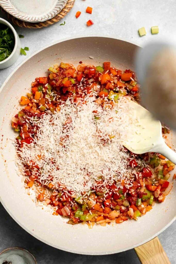 One Pot Vegetarian Jambalaya is a bold, flavorful Cajun rice dish with beans and veggies that's hearty, healthy, and easy to make. | aheadofthyme.com