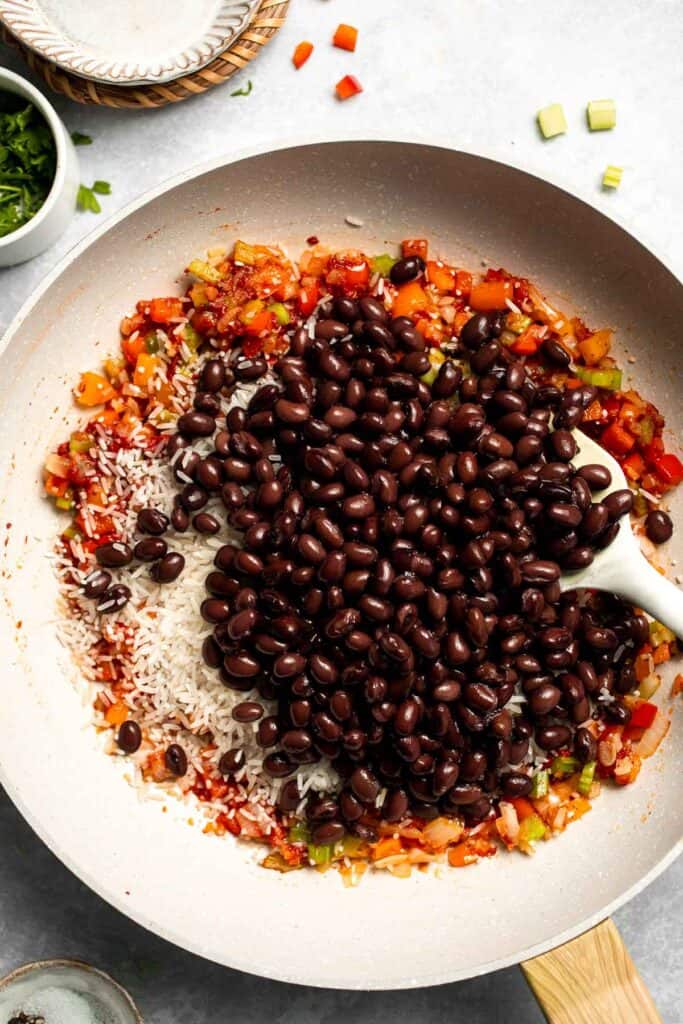 One Pot Vegetarian Jambalaya is a bold, flavorful Cajun rice dish with beans and veggies that's hearty, healthy, and easy to make. | aheadofthyme.com