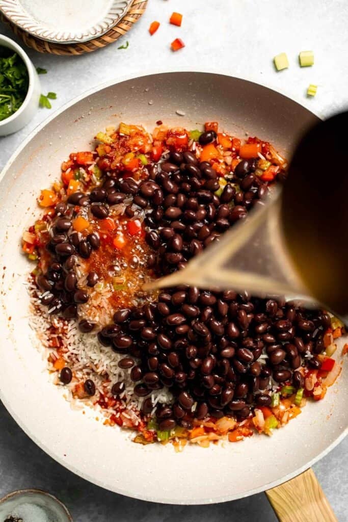 One Pot Vegetarian Jambalaya is a bold, flavorful Cajun rice dish with beans and veggies that's hearty, healthy, and easy to make. | aheadofthyme.com