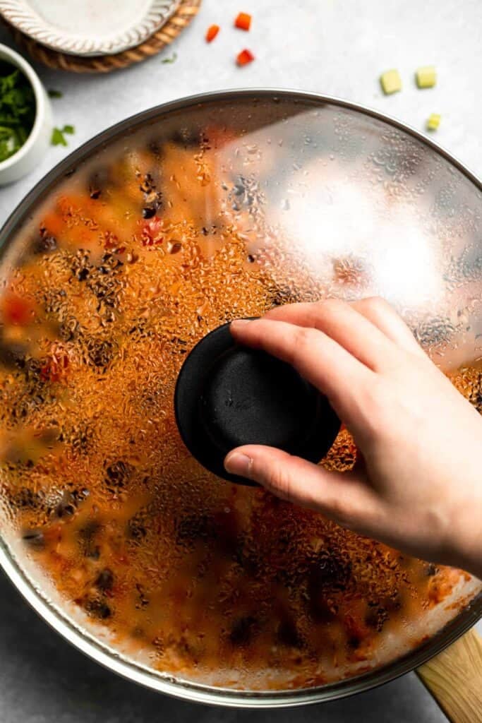 One Pot Vegetarian Jambalaya is a bold, flavorful Cajun rice dish with beans and veggies that's hearty, healthy, and easy to make. | aheadofthyme.com