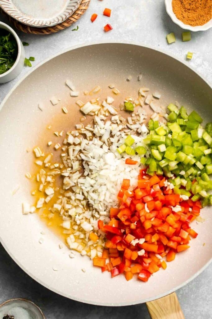 One Pot Vegetarian Jambalaya is a bold, flavorful Cajun rice dish with beans and veggies that's hearty, healthy, and easy to make. | aheadofthyme.com