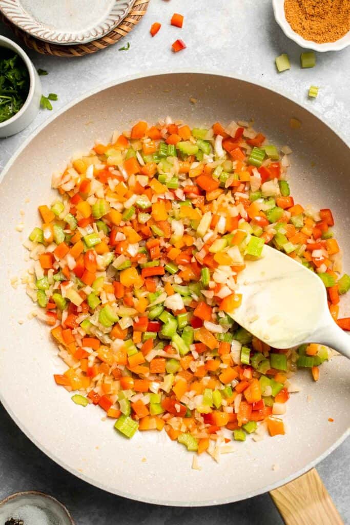 One Pot Vegetarian Jambalaya is a bold, flavorful Cajun rice dish with beans and veggies that's hearty, healthy, and easy to make. | aheadofthyme.com