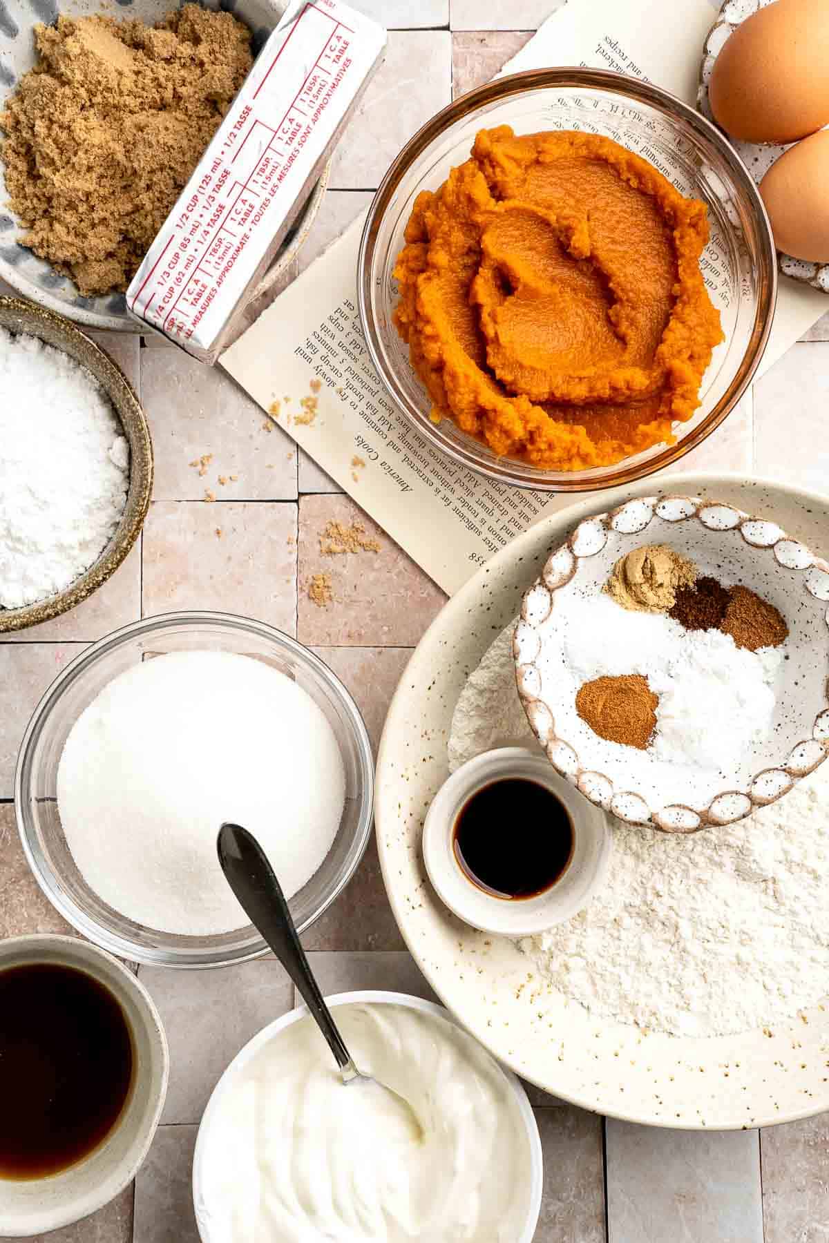 Pumpkin Coffee Cake, topped with a sweet and crunchy streusel and a maple glaze drizzle, is soft, moist, and filled with warm fall spices. | aheadofthyme.com