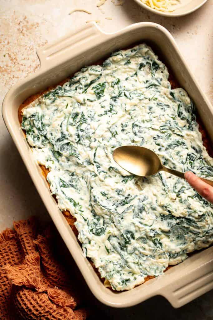 Pumpkin Lasagna with ricotta cheese and spinach is a delicious twist on traditional lasagna - the perfect cozy comfort food for fall. | aheadofthyme.com