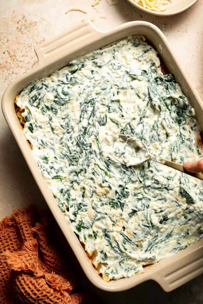 Pumpkin Lasagna with ricotta cheese and spinach is a delicious twist on traditional lasagna - the perfect cozy comfort food for fall. | aheadofthyme.com