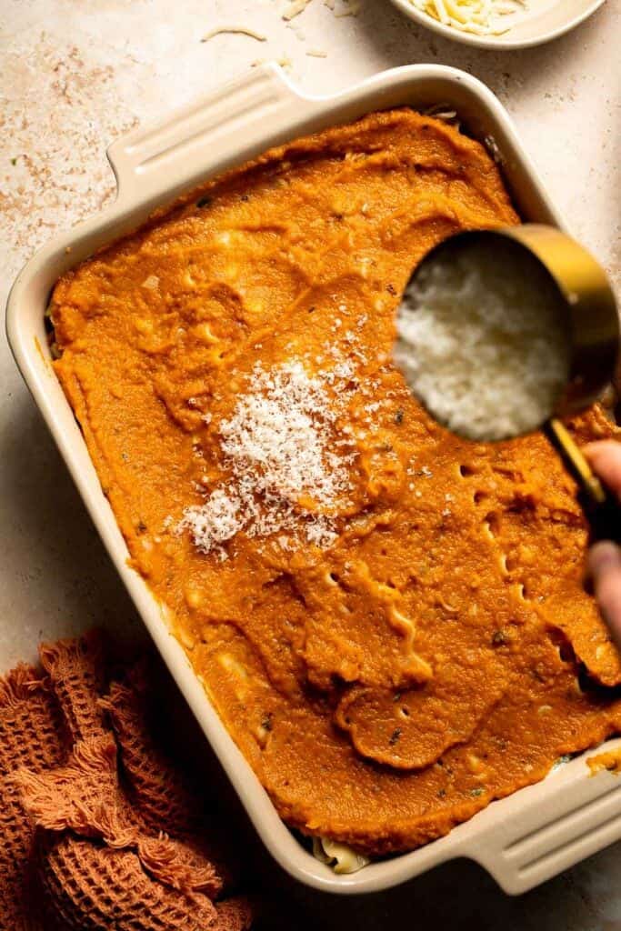 Pumpkin Lasagna with ricotta cheese and spinach is a delicious twist on traditional lasagna - the perfect cozy comfort food for fall. | aheadofthyme.com
