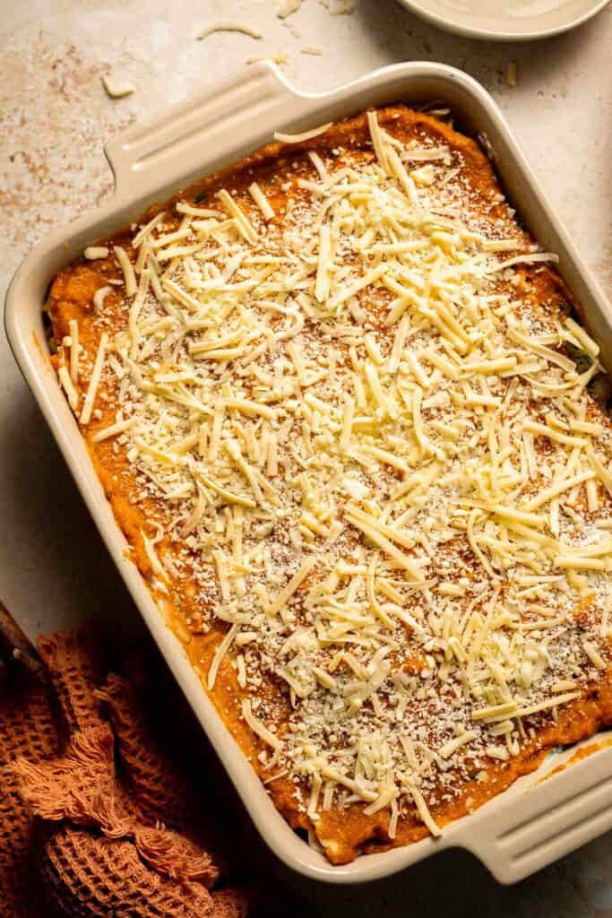 Pumpkin Lasagna with ricotta cheese and spinach is a delicious twist on traditional lasagna - the perfect cozy comfort food for fall. | aheadofthyme.com