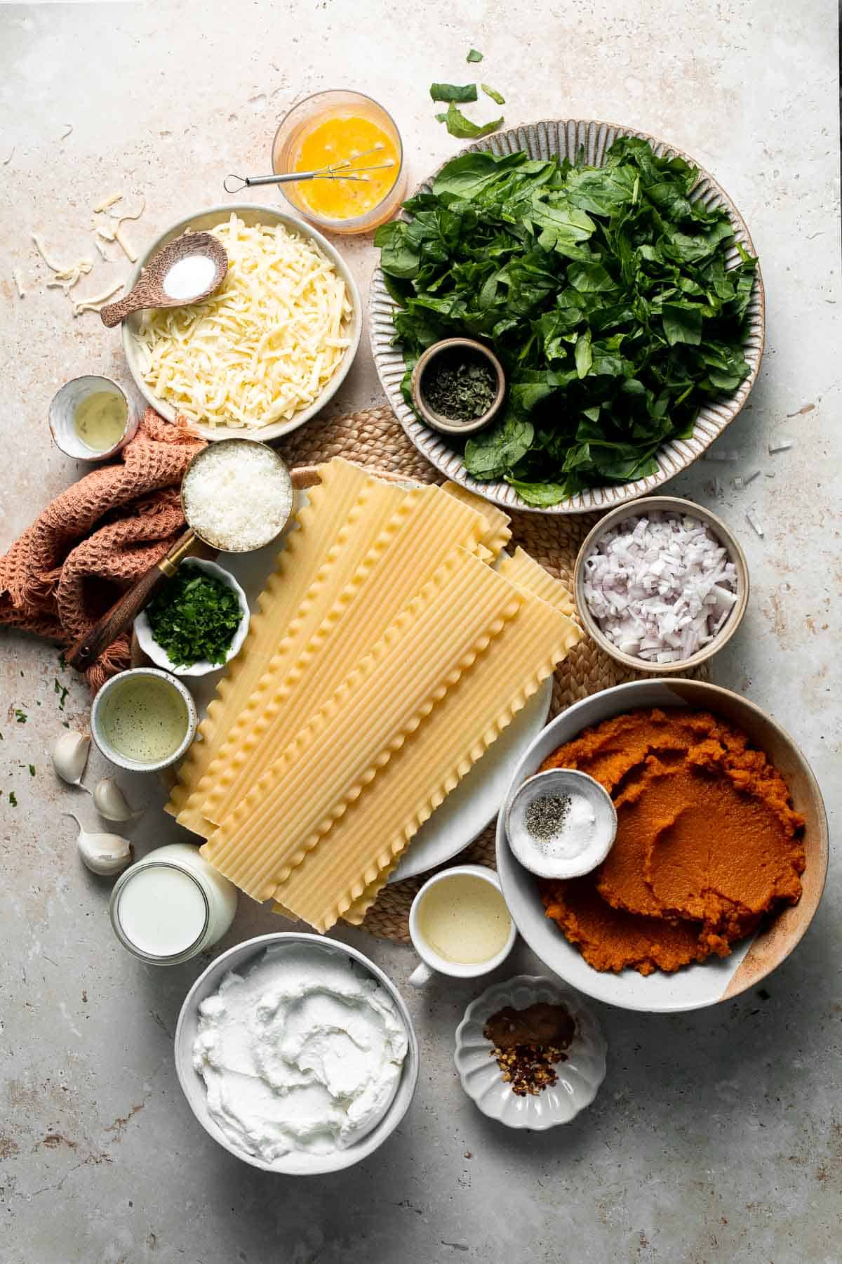 Pumpkin Lasagna with ricotta cheese and spinach is a delicious twist on traditional lasagna — the perfect cozy comfort food for fall. | aheadofthyme.com