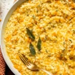 Enjoy a taste of fall with this creamy pumpkin risotto made with arborio rice, savory pumpkin, and aromatic herbs for a cozy, flavorful dish. | aheadofthyme.com