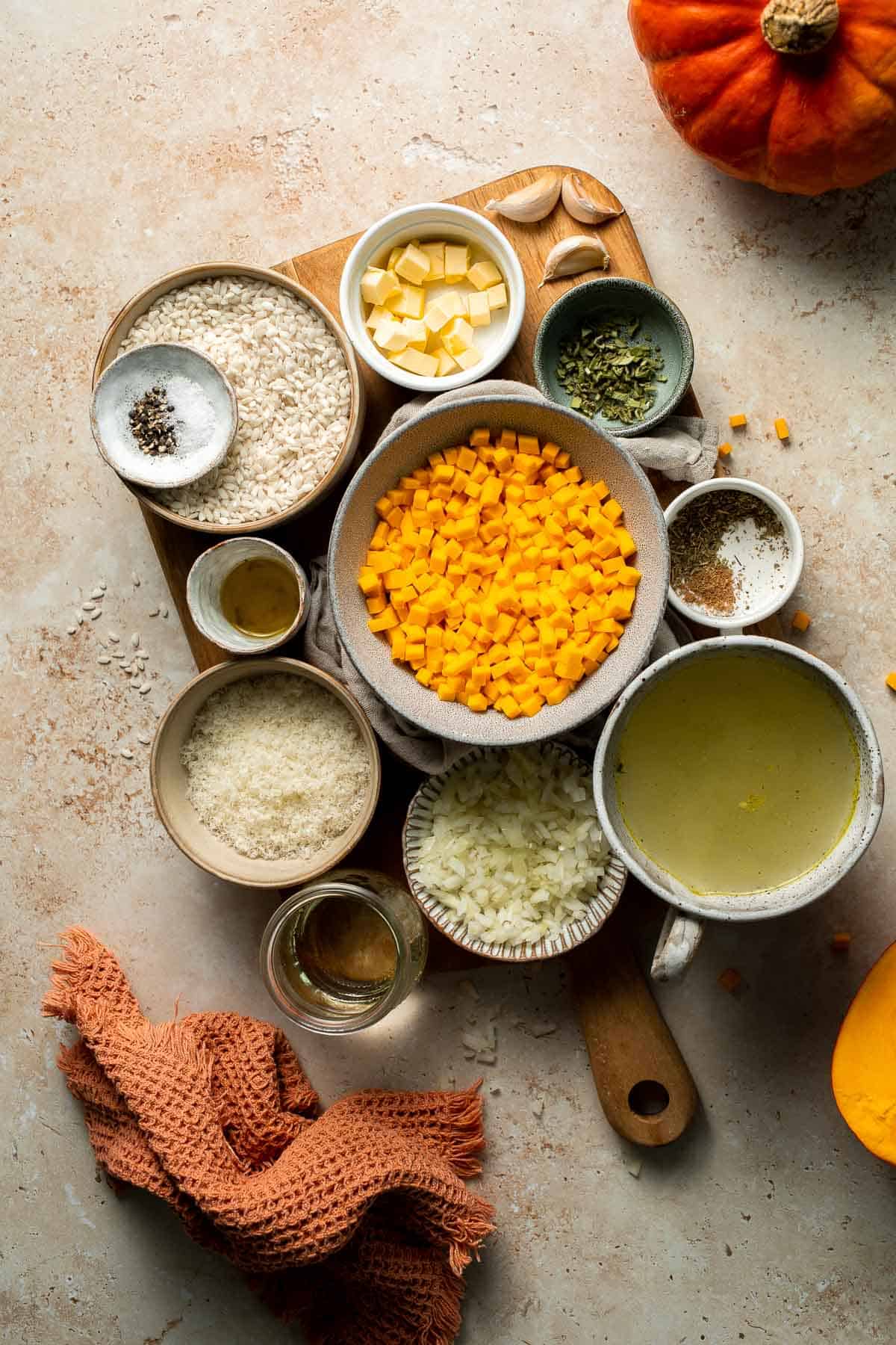 Enjoy a taste of fall with this creamy pumpkin risotto made with arborio rice, savory pumpkin, and aromatic herbs for a cozy, flavorful dish. | aheadofthyme.com